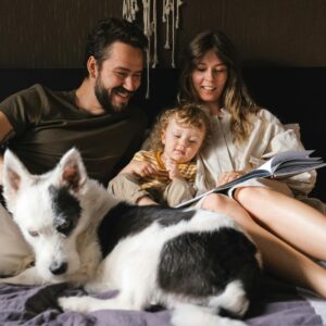 Family Reading a Book Together