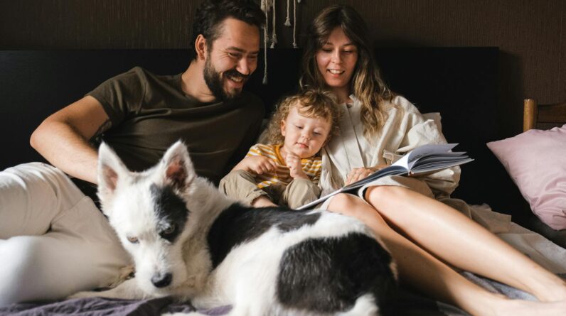 Family Reading a Book Together
